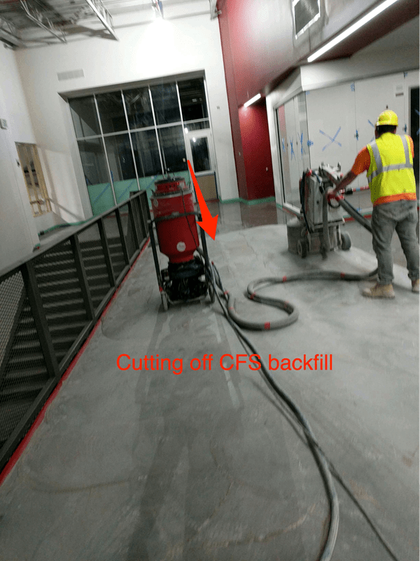 Cutting off Backfill on Concrete Floor