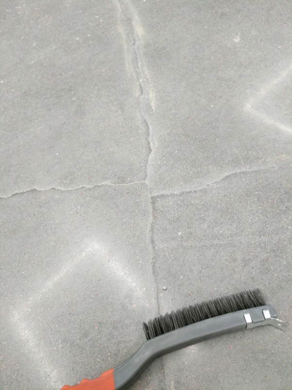 Concrete Floor on Elevated Deck with Intersecting Cracks